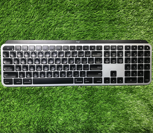 Keyboard on a grassy background